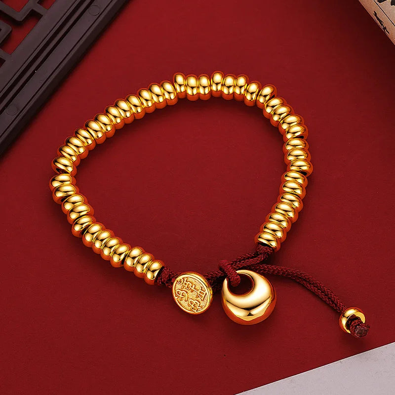 Männer und Frauen 9999 24K Echtgold Neue chinesische glatte Goldklumpen Frieden Freude Geld gewickeltes rotes Seilarmband Einfacher China-Chic