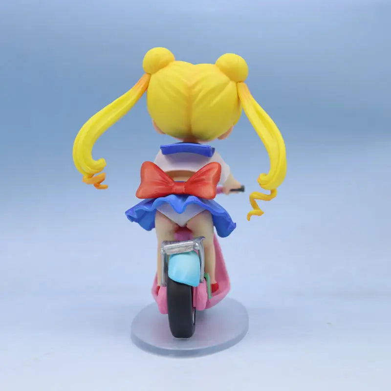 13cm Sailor Moon Anime Figure Q Version Tsukino Usagi Ride A Bike Figurine Collection Desktop Decor Ornament Doll Kids Toy Gift