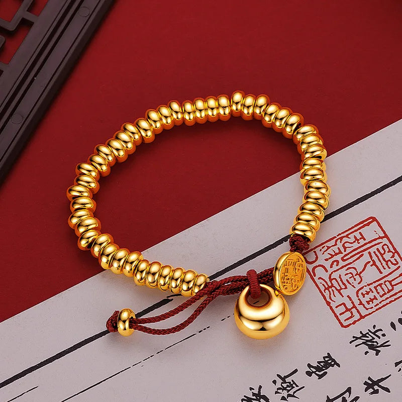 Männer und Frauen 9999 24K Echtgold Neue chinesische glatte Goldklumpen Frieden Freude Geld gewickeltes rotes Seilarmband Einfacher China-Chic