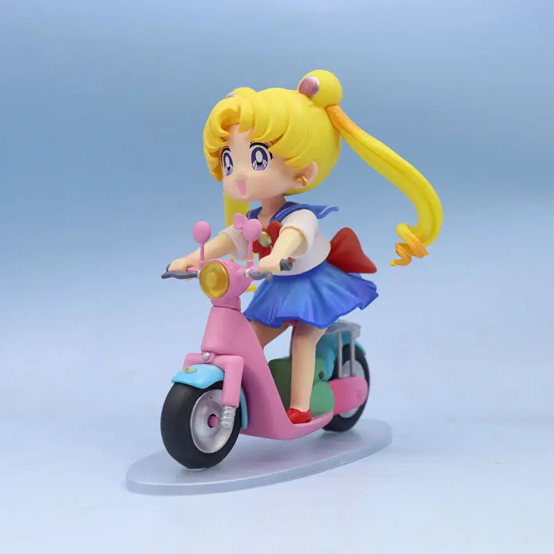 13cm Sailor Moon Anime Figure Q Version Tsukino Usagi Ride A Bike Figurine Collection Desktop Decor Ornament Doll Kids Toy Gift