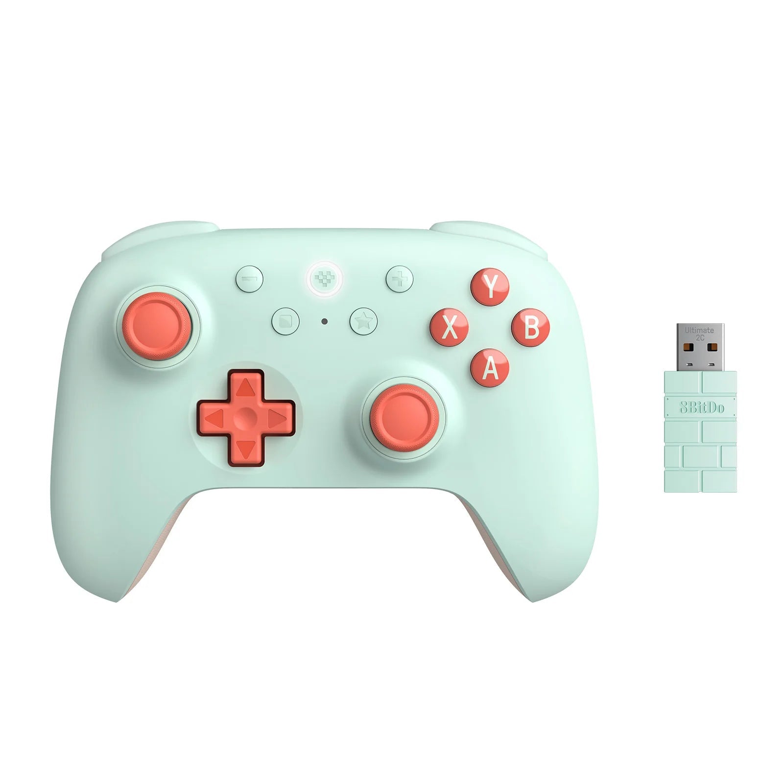 Mint green gaming controller with red buttons and a wireless USB adapter on a white background.