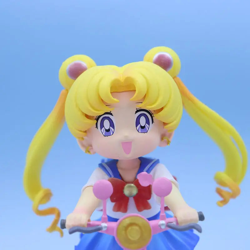 13cm Sailor Moon Anime Figure Q Version Tsukino Usagi Ride A Bike Figurine Collection Desktop Decor Ornament Doll Kids Toy Gift